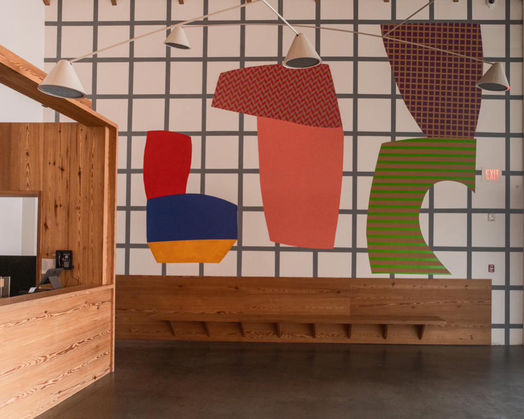 Gridded Commune: Mural in the Cafe by Almond Zigmund